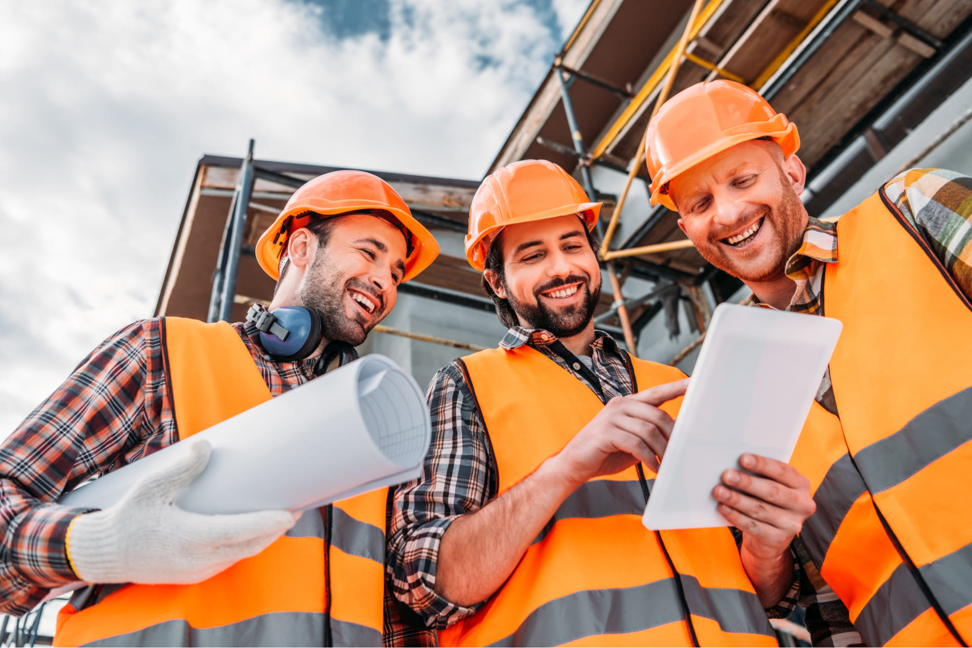 bottom-view-of-group-of-builders-with-blueprint-an-2021-08-29-22-35-48-utc-1.jpg