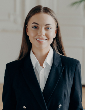 young-smiling-bussiness-woman-looking-at-camera-an-2021-09-02-23-47-32-utc.jpg